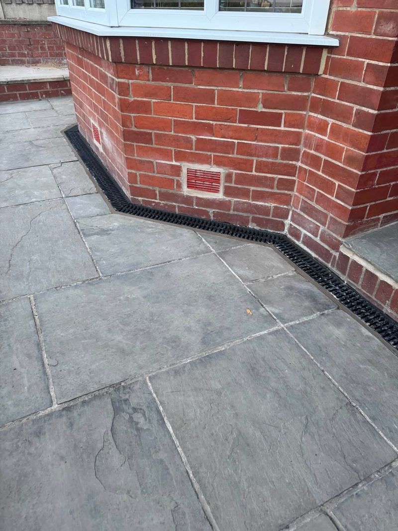 New air bricks and a drainage channel running around the bay window