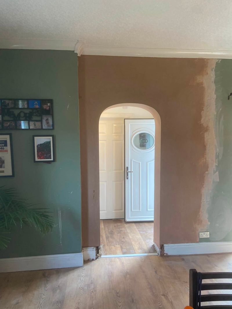 The arched opening seen from the living room side