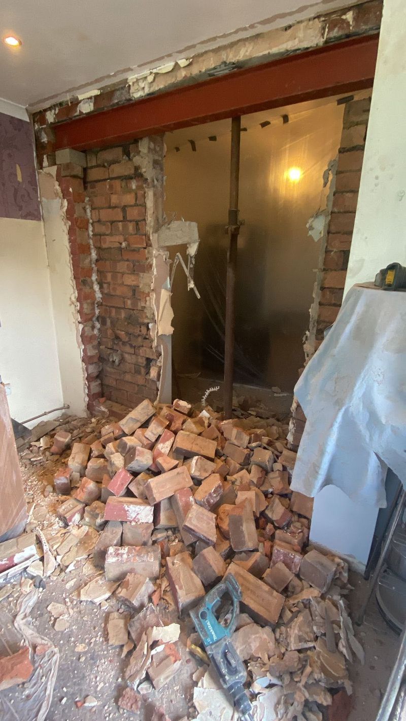 Brickwork removed below the new steel beam